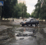 Асфальт смыло дождем на улице Пушкина - Lentachel.Ru