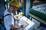 factory-worker-monitoring-industrial-machines-production-remotely-control-room_342744-90.jpg