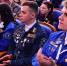 молодые люди, одетые в форму с символикой студенческих отрядов. На куртках видны нашивки, значки, медали и эмблемы, указывающие на принадлежность к различным отрядам и достижения, Изображение. - U74.Ru