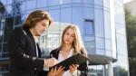 businessman-signing-clipboard.jpg